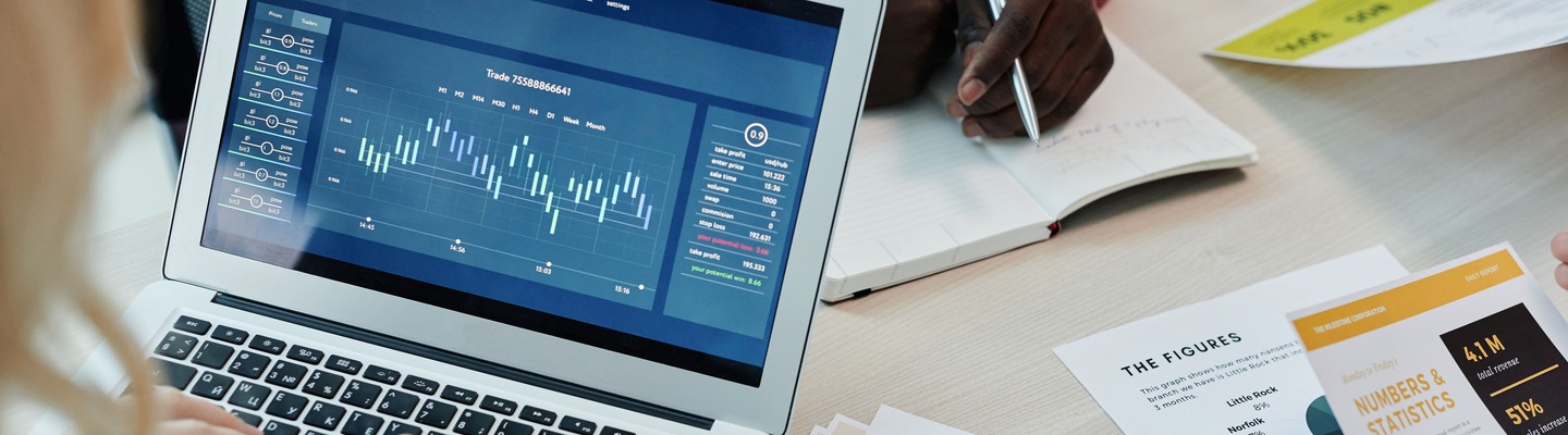 Finance team restructuring an income statement under new presentation requirements