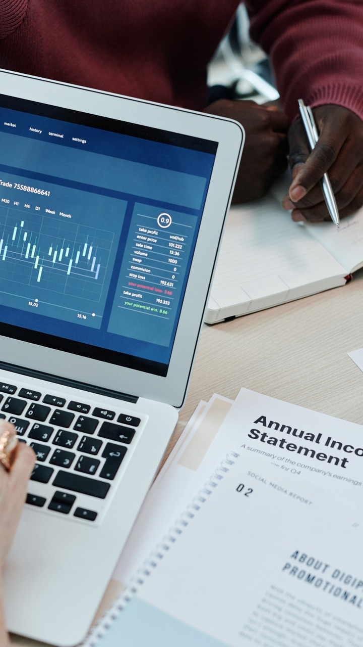 Finance team restructuring an income statement under new presentation requirements